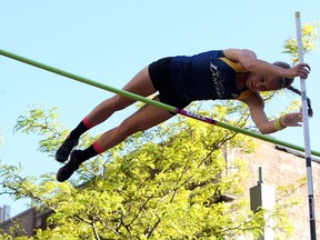 Rachel Wolfs competes in the Night Flight Pole Vault on Ouellette Avenue in Windsor on Friday, May 22, 2015.              (TYLER BROWNBRIDGE/The Windsor Star)