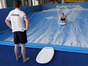 A lifeguard keeps an eye over the flowrider at the Adventure Bay Family Water Park in Windsor on Wednesday, January 29, 2014.                             (TYLER BROWNBRIDGE/The Windsor Star)