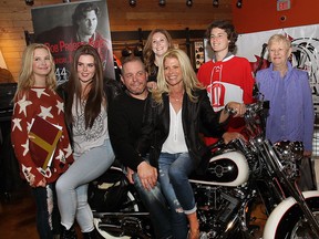 The ride captain for the fifth annual Bob Probert Memorial Ride was announced Wednesday, May 6, 2015, at the Thunder Road Harley-Davidson dealership  in Windsor, ON. Former NHL player Darren McCarty, a teammate of Probert's was designated as the captain. Posing for a photo from left are Probert's daughters Declyn, Tierney, McCarty, daughter Brogran, wife Dani, son Jack and mother Theresa Probert. (DAN JANISSE/The Windsor Star). (DAN JANISSE/The Windsor Star)