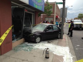 Emergency crews responded to Wyandotte Street East and Louis Avenue after a vehicle crashed into the front window of Royal Pita on Thursday, May 21, 2015. (NICK BRANCACCIO/The Windsor Star)