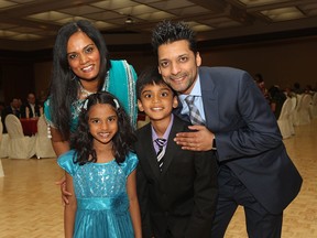 Chris Athavale with wife,  Karen and children Sarah and Jacob during the South Asian Centre of Windsor 28th annual dinner  and gala held at the Caboto Club on May 7, 2015.  (JASON KRYK/The Windsor Star)