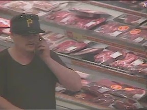 Surveillance photo of a suspect who allegedly stole meat from the Real Canadian Superstore in the 3400 block of Walker Road on Friday, May 15, 2015. (Courtesy of Windsor police)