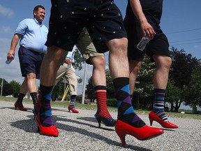 WINDSOR, ON.: MAY 30, 2015 -- Participants wear ladies pumps for Walk a Mile in Her Shoes at the Riverside Sportmen's Club, Saturday, May 30, 2015.  The walk is intended to raise awareness about sexual violence towards woman and children. (DAX MELMER/The Windsor Star)