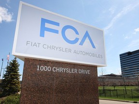 The Fiat Chrysler sign marks the entrance to the automaker's world headquarters in Auburn Hills, Mich. (DAX MELMER / Windsor Star files)