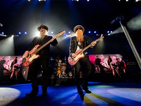 ZZ Top performing at the California Country Music Festival in April, 2015. Dusty Hill (L), Billy Gibbons (R), and Frank Beard (background). (Christopher Polk / Getty Images)