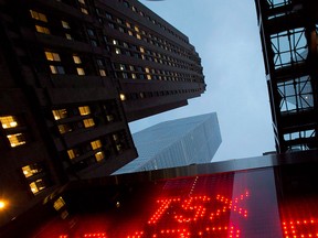 A tote board TSX numbers in Toronto, on Dec.31, 2012. THE CANADIAN PRESS/Frank Gunn
