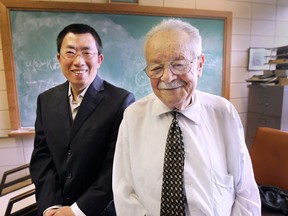 Post doctoral student Long Jian Liu, left, and professor emeritus Mordechay Schlesinger, of the University of Windsor, are shown on Monday, June 8, 2015, at the school. They have been working on a patented non-invasive diagnosis technique to monitor tumour activity and confirm if chemotherapy or radiation is working. (DAN JANISSE/The Windsor Star)