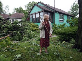 Joesphine Marrell stands next to her home in Leamington, Ont. on June 6, 2010. (BEN NELMS/The Windsor Star)