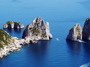 The Faraglioni are three spurs of rock which rise up out of the sea, within metres of Capri's southern coast.