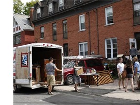 Students are busy moving into new houses and apartments on the last weekend before the fall term of university begins, especially in the neighbourhood of Sandy Hill, which is located next to the University of Ottawa, on Aug. 30, 2014. (David Kawai/Postmedia News)