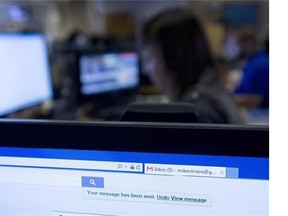 The undo send button is shown on a Gmail account as employees work on their computers in Toronto on Wednesday, June 24, 2015. Gmail has implemented a new feature that allows people to undo a sent email. THE CANADIAN PRESS/Nathan Denette