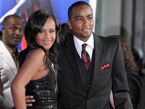 Bobbi Kristina Brown, left, and Nick Gordon attend the Los Angeles premiere of "Sparkle" at Grauman's Chinese Theatre in Los Angeles. Brown is moving to hospice care after months of receiving medical care. Pat Houston says in a statement Wednesday, June 24, 2015, that Whitney Houston’s daughter’s “condition has continued to deteriorate. She was found face-down and unresponsive in a bathtub of her Georgia home on Jan. 31. (Jordan Strauss/Invision/AP, File)