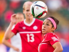 Canada's Desiree Scott eyes the ball during Canada's Group A match against New Zealand at the FIFA Women's World Cup at Commonwealth Stadium in Edmonton, Canada on June 11, 2015.   AFP PHOTO/GEOFF ROBINSGEOFF ROBINS/AFP/Getty Images