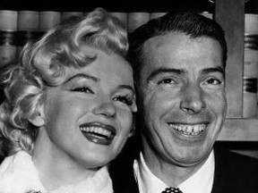 Joe DiMaggio baseball's famed "Yankee Clipper," and screen actress Marilyn Monroe, smile cheek to cheek as they wait patiently in Judge Charles Perry's chambers for their marriage ceremony in San Francisco. The wedding climaxed a romance of more than a year.