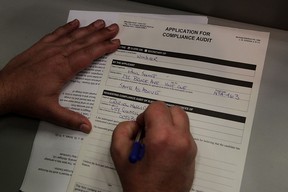 Paul Synnott files application for a review of campaign finances of candidate Gabriel Maggio at City Clerk’s office, Thursday June 25, 2015. (NICK BRANCACCIO/The Windsor Star).