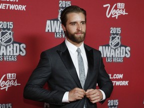 Florida Panthers' Aaron Ekblad poses on the red carpet before the NHL Awards show Wednesday, June 24, 2015, in Las Vegas. (AP Photo/John Locher)