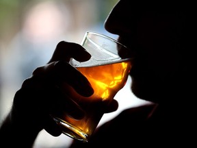 A silhouetted beer enthusiast takes a sip of craft beer in this file photo. (JUSTIN SULLIVAN/Getty Images)