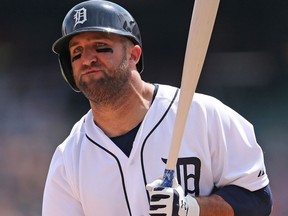 Tyler Collins #18 of the Detroit Tigers reacts after striking out in the seventh inning of the game against the Oakland Athletics on June 4, 2015 at Comerica Park in Detroit, Michigan. (Photo by Leon Halip/Getty Images)