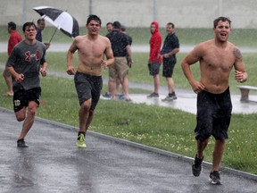Windsor Spitfires Trevor Murphy, right, paces himself with teammates during strength and conditioning testing at St. Joseph's Catholic High School Friday June 5, 2015. (NICK BRANCACCIO/The Windsor Star)