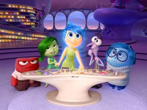 In this image released by Disney-Pixar, characters, from left, Anger, voiced by Lewis Black, Disgust, voiced by Mindy Kaling, Joy, voiced by Amy Poehler, Fear, voiced by Bill Hader, and Sadness, voiced by Phyllis Smith appear in a scene from "Inside Out," in theaters on June 19. (Disney-Pixar via AP)