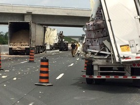 The eastbound lanes of Highway 401 west of Walker Road are closed after crash involving two transport trucks on Thursday, June 18, 2015. (Courtesy of Tecumseh Fire)