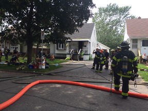 Windsor fire crews clean up following a house fire at 1431 Francois Rd. in Windsor, Ont. June 22, 2015. (DAN JANISSE/The Windsor Star)