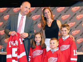 The Detroit Red Wings introduced Jeff Blashill as the new head coach of the team on Tuesday, June 9, 2015, at the Joe Louis Arena in Detroit, MI. Blashill poses for a photo with his wife Erica and children Teddy, Josie and Owen during the event. (DAN JANISSE/The Windsor Star)