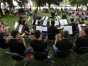 The W. F. Herman Secondary School band performs under the watchful eye of conductor Bernadette Berthelotte at Reaume Park in Windsor on Tuesday, June 2, 2015. The concert was the bands annual finally for the year.                (TYLER BROWNBRIDGE/The Windsor Star)