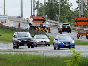 The eastbound and westbound lanes of E.C. Row are seen at the Walker Road overpass on June 1, 2015.   Construction continues on the overpass.  (JASON KRYK/The Windsor Star)