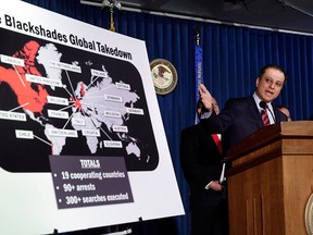 Preet Bharara, U.S. Attorney for the Southern District of New York, speaks at a press conference to announce a massive law enforcement action targeting the creators of the Blackshades software - a malicious computer software that was openly sold on a website- on May 19, 2014 in New York City. The takedown was coordinated between 19 nations and included numerous arrests.  (Andrew Burton/Getty Images)