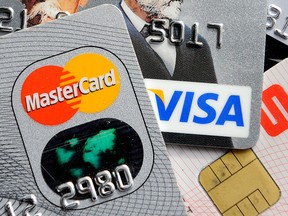 Credit cards are pictured in this file photo. (AP Photo/Martin Meissner)