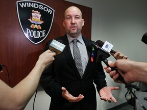 Windsor Police Service Const. Rob Durling of the financial crimes unit speaks during a media conference on Friday, June 19, 2015, regarding fraud scams.  (DAN JANISSE/The Windsor Star)