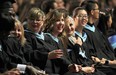 The University of Windsor held its spring convocation ceremony on Tuesday, June 16, 2015, at the St. Denis Centre in Windsor. Graduates from the Faculty of Education and Graduate Studies received their degrees during the ceremony. Some of the graduates are shown during the ceremony. (DAN JANISSE/The Windsor Star)