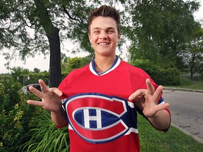 Catalin Morin, 14, won a draw to spend a day on and off the ice with Montreal Canadiens goalie Carey Price in Kelowna, B.C. Now he and his single mom need to come up with the money to send him to on the journey. Morin is shown Monday, June 8, 2015, proudly sporting his Montreal Canadiens jersey.(DAN JANISSE/The Windsor Star)