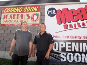 Ken Joseph, co-owner of Joseph's Produce, and   Marc Romualdi, president of M.R. Meat Markets, stand outside their new store on Walker Road in Windsor. (JASON KRYK/The Windsor Star)