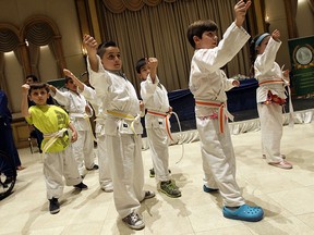 The little ninjas show off their moves during a demonstration at the Ciociaro Club in Windsor on Thursday, June 4, 2015.The group is comprised of kids with cancer and other life threatening illnesses and is hosted by In Honour of the Ones We Love. (TYLER BROWNBRIDGE/The Windsor Star)