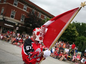 Dan Beaudoin, also known as 'Canada Dan' participates in the Windsor Canada Day Parade, Tuesday, July 1, 2014.  (DAX MELMER/The Windsor Star)