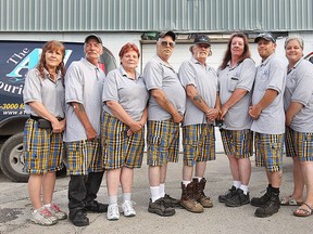 Staff at The A1 Courier Service in Windsor, ON. are making a fashion statement while raising money for prostrate cancer research. They are participating in the Plaid for Dad campaign that takes place across the country June 19, 2015. Staff, from left, Sue Simpson, Jack Simpson, Rose McAuliffe, Earl McAuliffe, James McAuliffe, Michelle Legebow, Rob LaRock, Anna Macala, Tara Sauve and Debbie Letwin pose at the Windsor, ON. business wearing their plaid shorts. (DAN JANISSE/The Windsor Star)