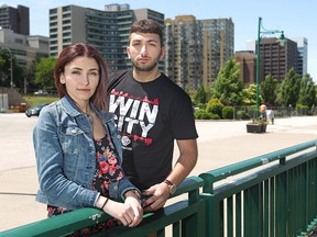 WINDSOR, ON.: JUNE 6, 2015 -- Friends, Reem Alesber, 19, left, and Ibrahim Hallal, 20, are pictured at the waterfront in front of the Riverfront Festival Plaza, Saturday, June 6, 2015.  The pair rescued a woman who went in the water and would have presumedly drowned if not for their help.  (DAX MELMER/The Windsor Star)