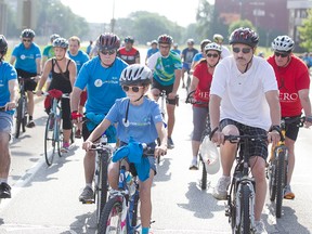Participants in the Ride Don't Hide 20km and 10km ride cycle along the riverfront, Sunday, June 21, 2015.  The event seeks to raise mental health awareness while also raise funds for local mental health programs.  (DAX MELMER/The Windsor Star)