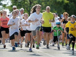 Files: Participants at the Brain Tumour Foundation of Canada's annual Spring Sprint at the Riverside Sportsmen's Club, take off on their run/walk along the Ganatchio Trail, Saturday, June 9, 2012.  (DAX MELMER/The Windsor Star)