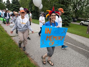 Participants in the Windsor Spring Sprint 2015 walk along the Ginatchio Trail Saturday, June 13, 2015.  Money raised from the event goes to the Brain Tumour Foundation of Canada. (DAX MELMER/The Windsor Star)