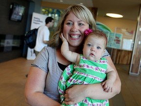 Carla Vlad and her daughter Stella are pictured at the Windsor International Aquatic and Training Centre on Tuesday, June 23, 2015. Stella was born premature and her family utilized the services at the Ronald McDonald House in London, Ont. (DYLAN KRISTY/The Windsor Star)