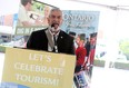 Essex County Warden and Lakeshore Mayor Tom Bain speaks at the Tourism Week kick-off event on Tuesday, June 2, 2015. (DYLAN KRISTY/The Windsor Star)