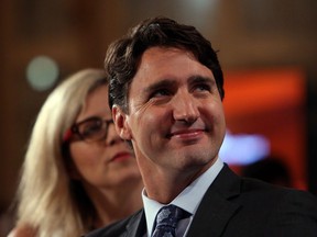 Justin Trudeau smiles after delivering a speech on Canada-US relations in Ottawa on Monday, June 22, 2015. The Liberal leader says after almost a decade of Harper as prime minister, Canada has less influence in Washington. THE CANADIAN PRESS/Fred Chartrand