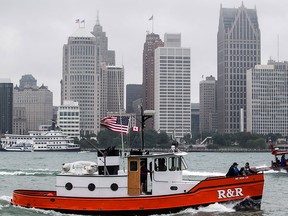 The annual International Tug Boat Race made it's way down the Detroit River, Saturday, June 20, 2015.  The race started below the Ambassador Bridge and finished at Windsor's Dieppe Park.   (DAX MELMER/The Windsor Star)