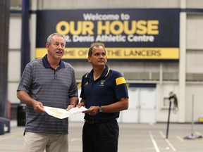 Mike Havey, left, Director of Athletics, and Michael Khan, Dean of Human Kinetics at the University of Windsor on June 25, 2015. (JASON KRYK/The Windsor Star)