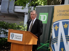 University of Windsor president Alan Wildeman speaks at the TD Chatham Street Parkette in Windsor, Ont. on Tuesday, June 2, 2015. TD Bank Group donated $850,000 to be used towards adding greenery to the parkette. (DYLAN KRISTY/The Windsor Star)