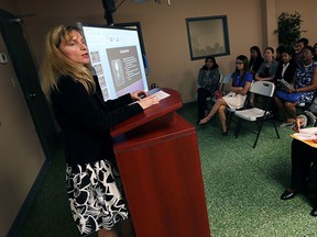 Keynote speaker Doina Tintoi talks to the Management Training Program graduates at WEST in Windsor on Thursday, June 25 2015.                  (TYLER BROWNBRIDGE/The Windsor Star)