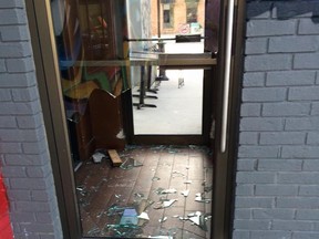 Someone smashed the glass door at the Willistead Restaurant Monday morning and stole three bottles of Whisky. Several Walkerville businesses, cars and homes have been hit. (Mark Boscariol/Special to the Star)